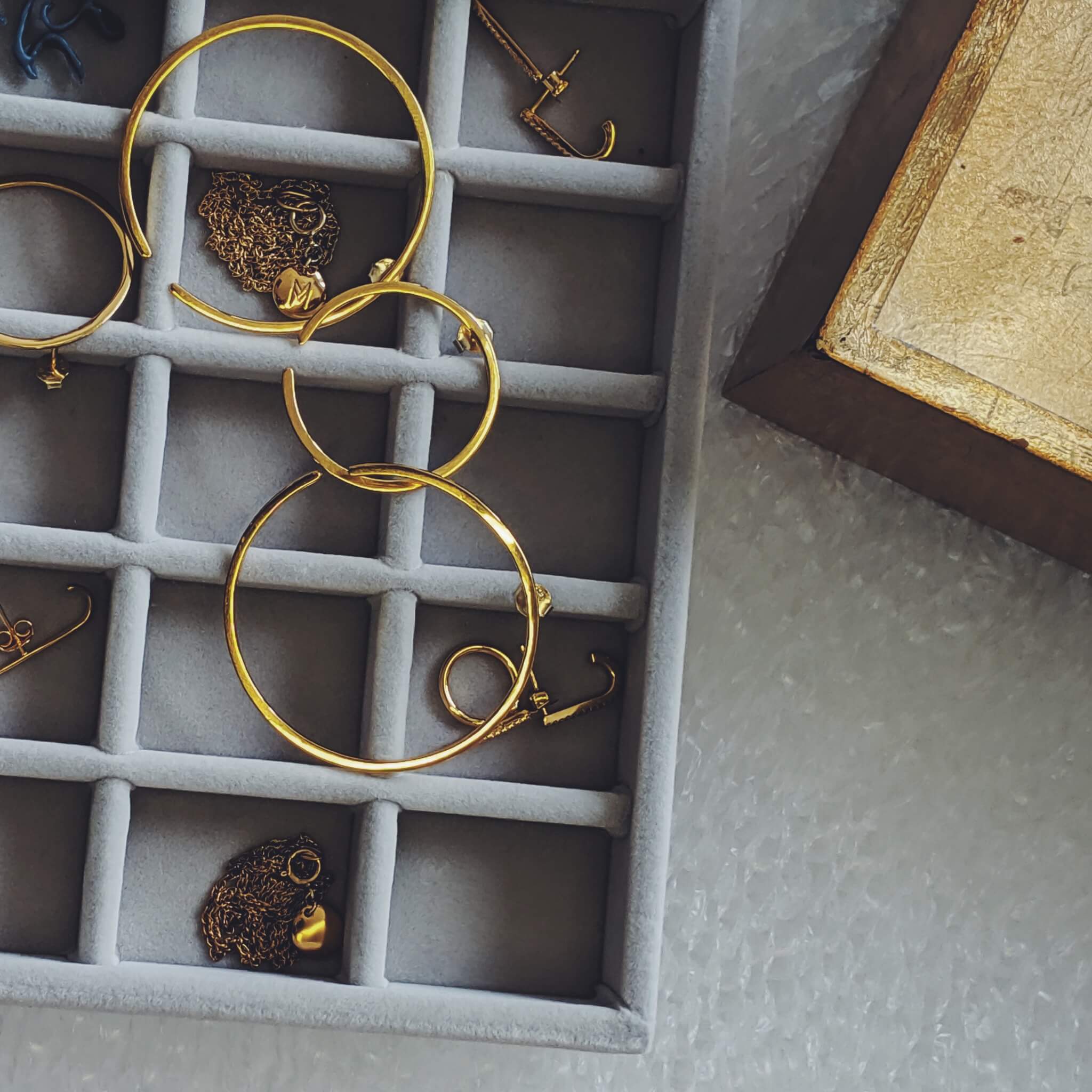 Large Illusion Hoops flat lay