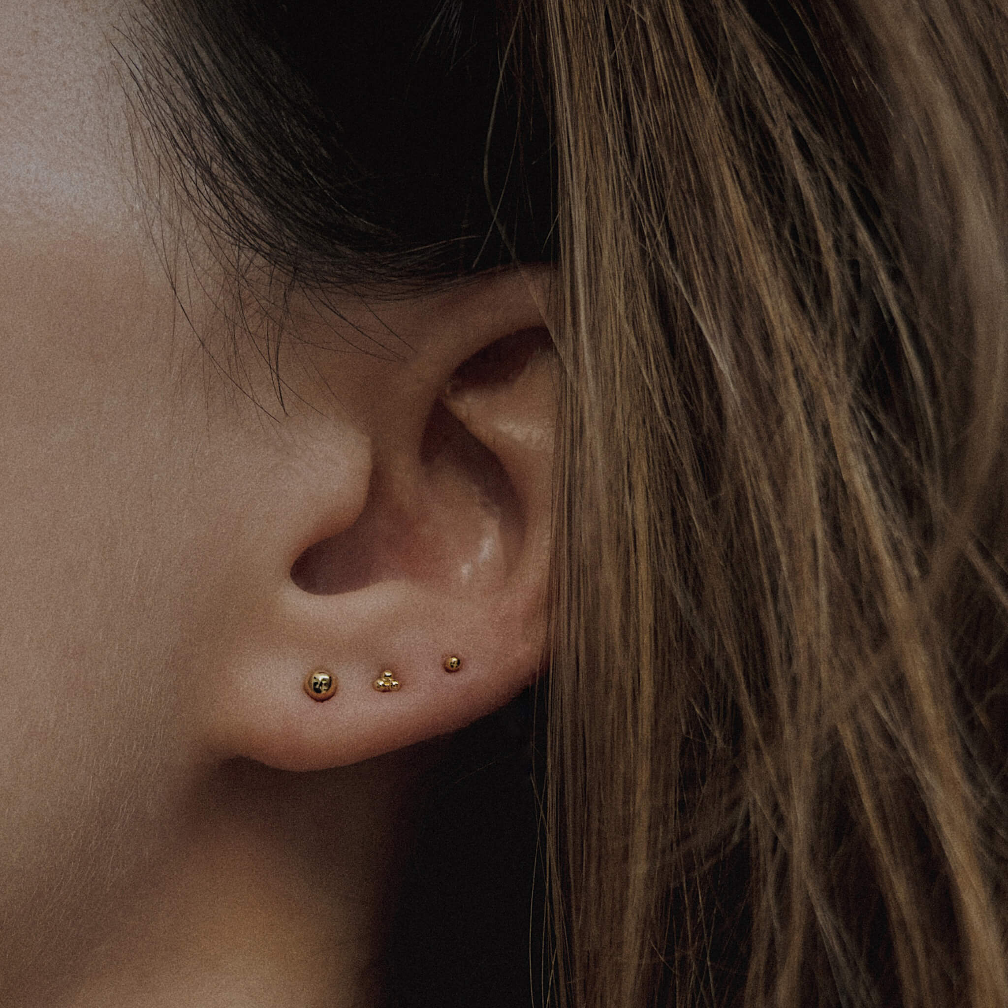 Tiny Trinity Nap Earrings (Gold) on Model