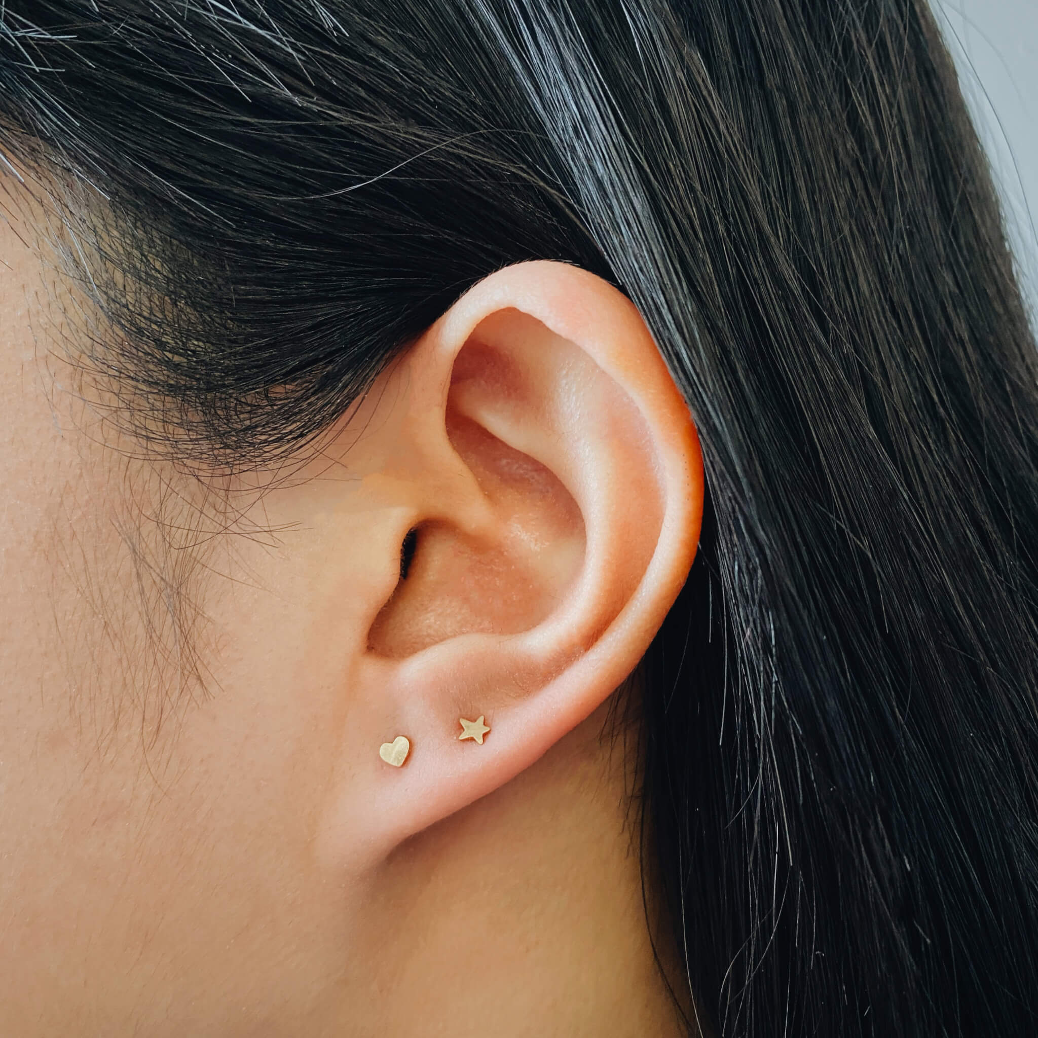 Classic Star Nap Earrings (Gold) on model